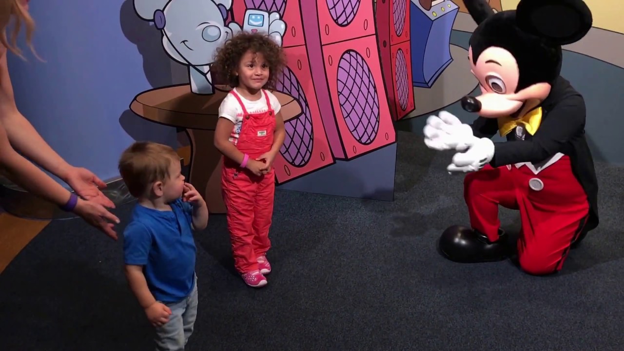 Baby Meet's Mickey Mouse at Epcot Character Spot