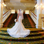Jordann in wedding dress on Disney’s Grand Floridian Grand Staircase.jpg
